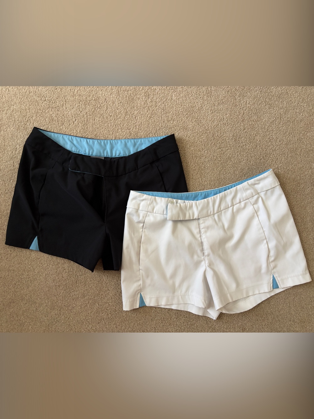 2 pair Nike Women’s Dri-fit Tennis Shorts - Black & White with Light Blue Trim
